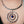 Load image into Gallery viewer, Collier point bleu porté de face
